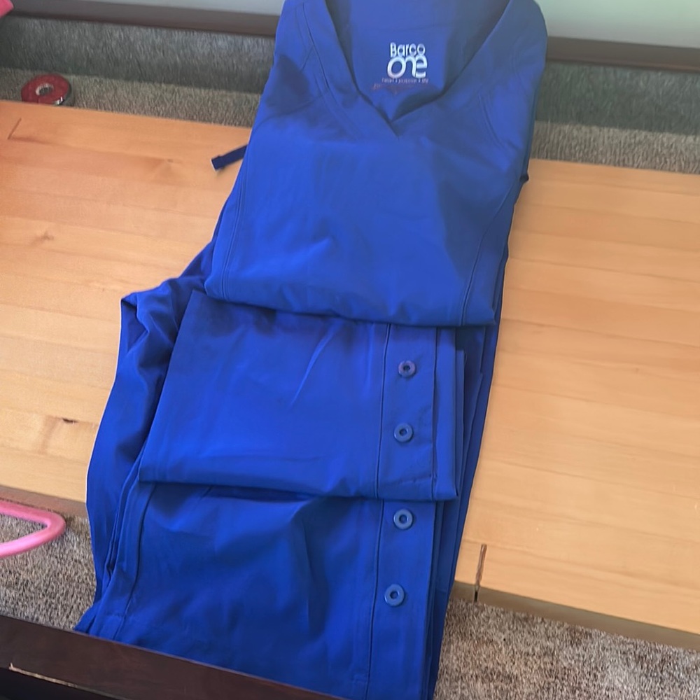 Barco one size small jacket size small blue stretchy buttons on bottoms $100